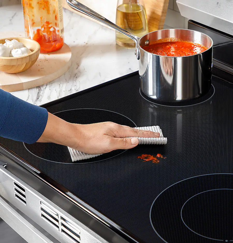 GE - 30 in. Wide 4 Elements 5.3 Cu. Ft. Freestanding Electric Range with Steam Cleaning and Radiant Cooktop - Image 7